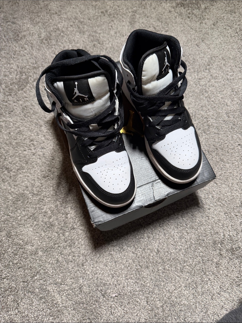 Jordan Kids Black and White High-Top Sneakers